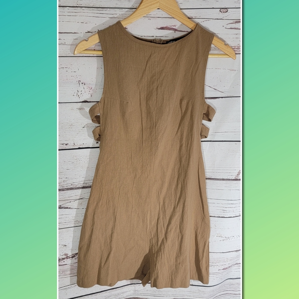 5/ $25 Jumpsuit with side cut out detail